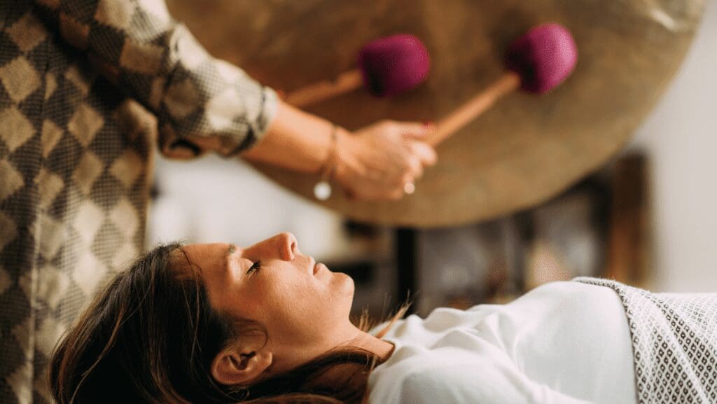 woman experiencing the sound bath benefits