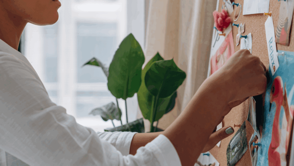 woman crafting a vision board
